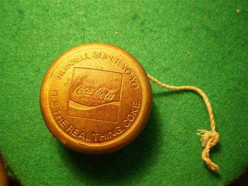 Gold colored Coca-Cola Yoyo