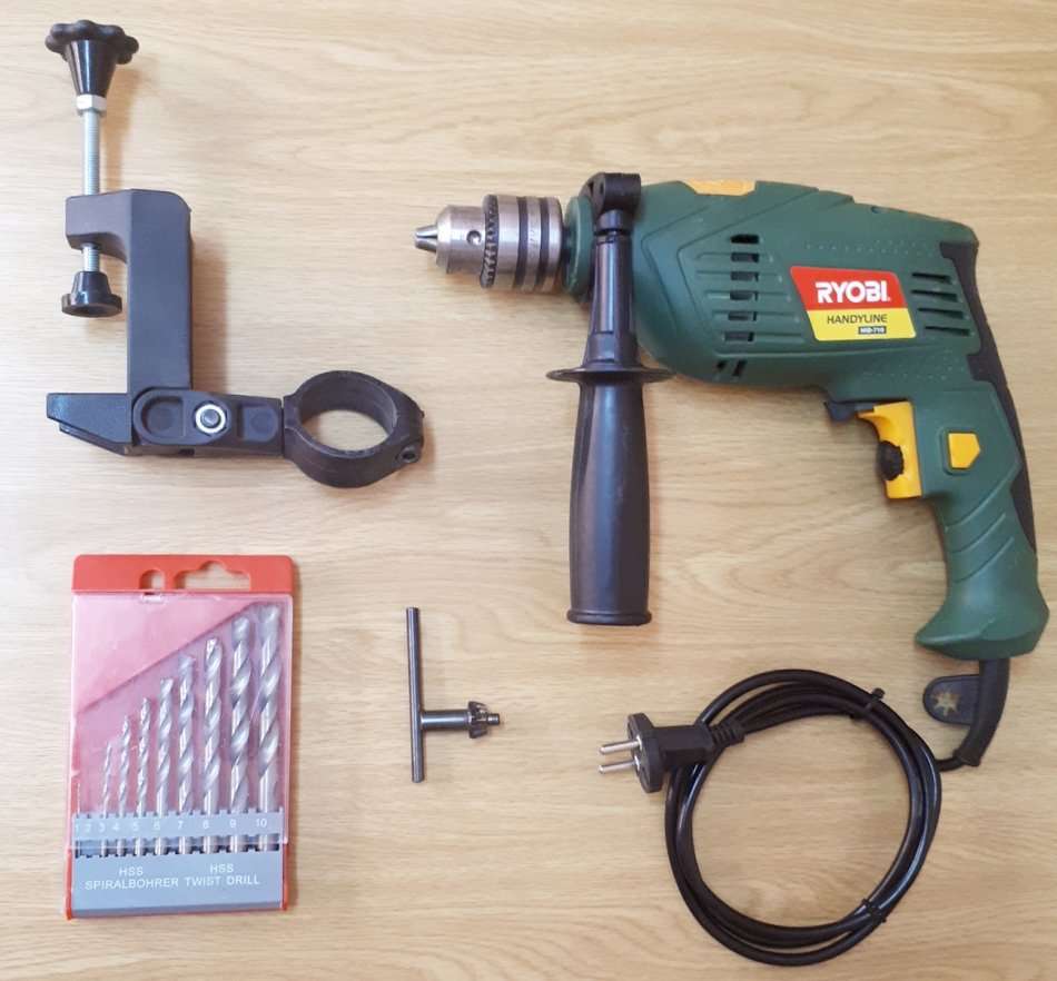 RYOBI 710 W Impact Drill (boxed) + Extras