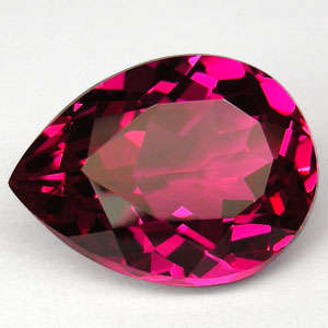 22.45cts PEAR CUT  RED PINK TOPAZ