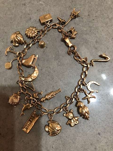 Gold Charm Bracelet with 23 Gold Charms - 30g