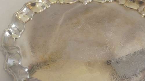Lovely Silverplated tray with scalloped rim