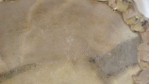 Lovely Silverplated tray with scalloped rim