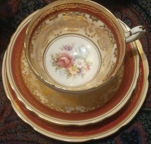Elegant Royal Paragon floral sprig gold, pink and a maroon band Rococo-style Tea trio 1952-1956