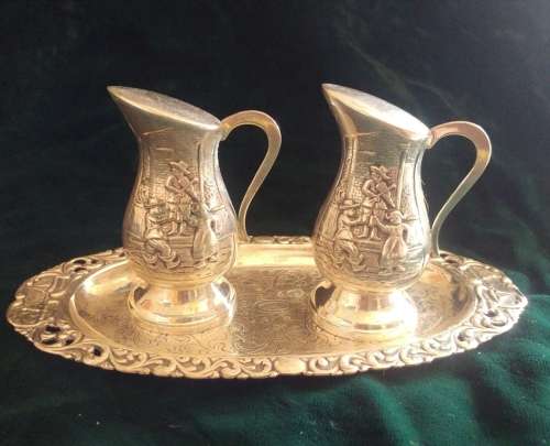 Stunning vintage embossed silverplate Dutch salt and pepper set with tray