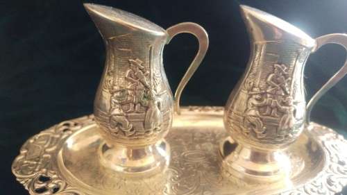 Stunning vintage embossed silverplate Dutch salt and pepper set with tray