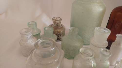 Delightful large 17 vintage ink, medicine glass bottle collection in blue and green