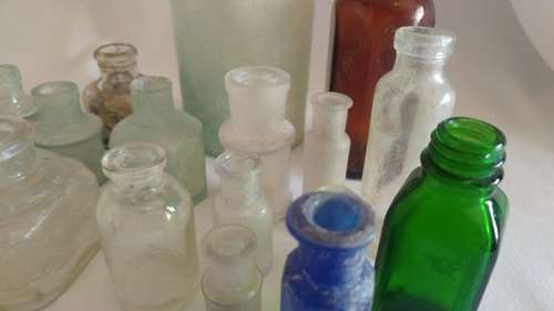 Delightful large 17 vintage ink, medicine glass bottle collection in blue and green