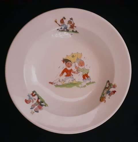 Childs glazed earthenware cereal bowl with gnome decoration