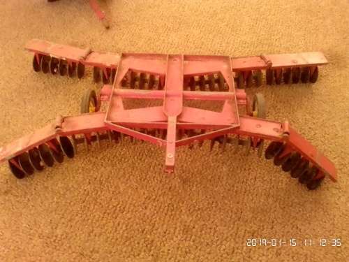 International tractor with plough, wagon and two cars