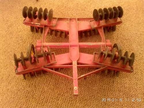 International tractor with plough, wagon and two cars