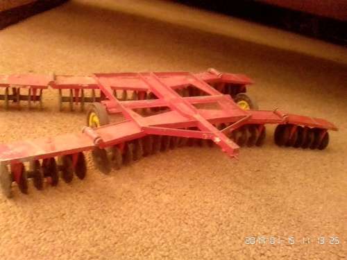 International tractor with plough, wagon and two cars