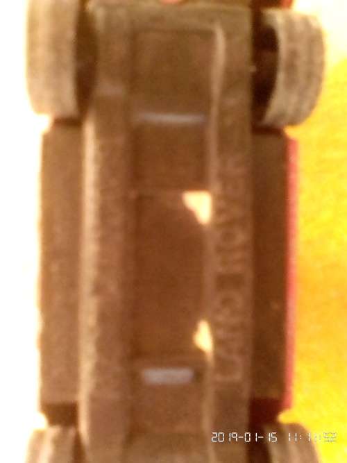 International tractor with plough, wagon and two cars