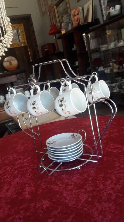 Beautiful Miniature Teaset duo's on kettle shaped stand