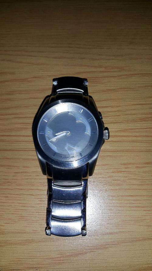 mens fossil watch not a mark or scratch-need new battery has digital display and metal strap