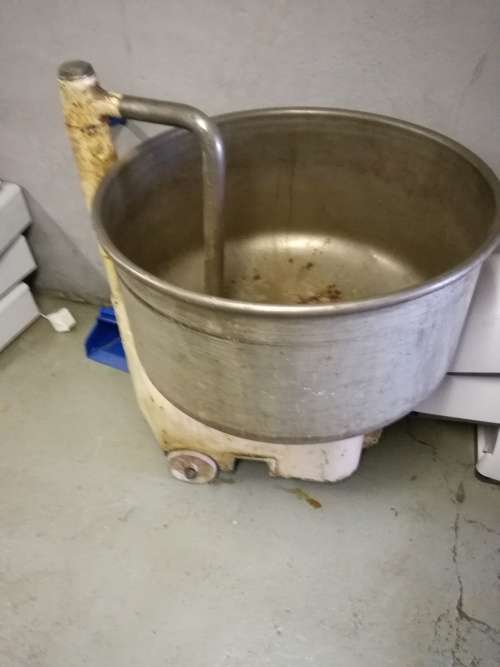 Lot of bakery equipment,includes oven, 2x mixers, and bread trays