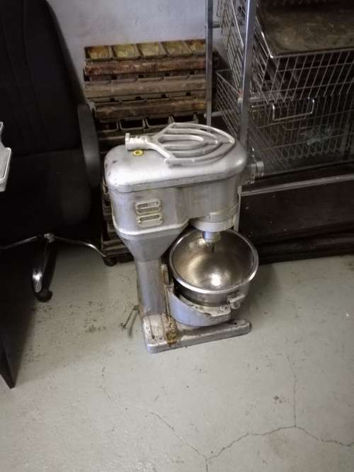 Lot of bakery equipment,includes oven, 2x mixers, and bread trays