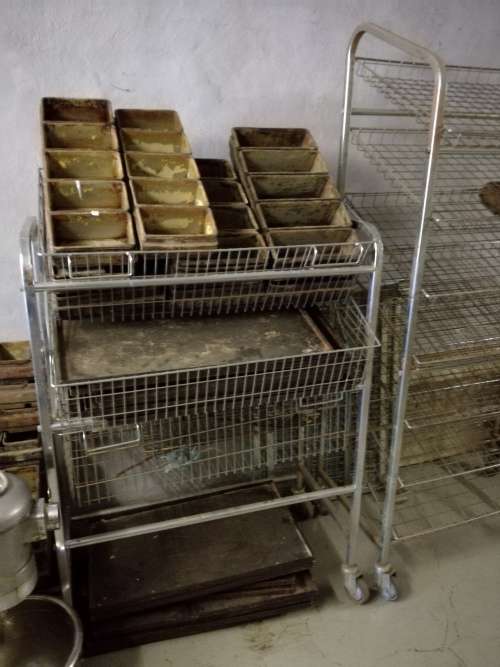 Lot of bakery equipment,includes oven, 2x mixers, and bread trays