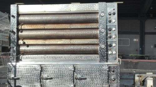 Lot of bakery equipment,includes oven, 2x mixers, and bread trays