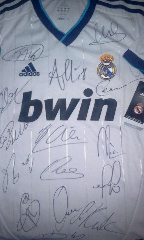 Real Madrid Team Signed 12/13 Jersey + C.O.A.