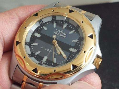 LORUS TRI-LUM  LIGHT POWERED ENERGY V851-6290 - LORUS -PART OF SEIKO WATCH CORPORATION