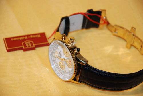 KRUG BAUMEN AIR TRAVELLER DIAMOND GOLD PLATED WHITE DIAL  BLACK STRAP - AUTHENTIC -