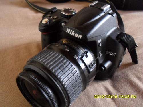 NIKON D5000 with 18-55mm 1:3.5-5.6 GII  ED   DX nikon lens .