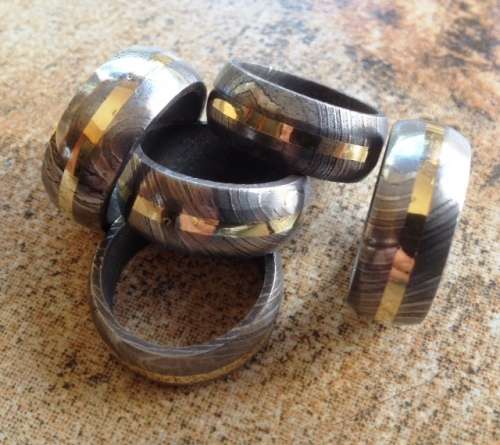 Damascus Steel HANDMADE Ring with Solid Brass band inlay. Only R699. Was R 1799.00