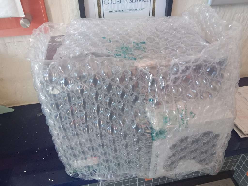 Brand New /Sealed Xbox Series X with 2 Controllers and 1 Game