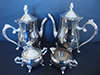 FOUR PIECE SILVER PLATED TEA AND COFFEE SET ON SCROLL FEET