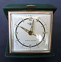 VINTAGE TOKYO CLOCK WIND UP TRAVEL ALARM CLOCK IN LEATHER CASE - WORKING CONDITION