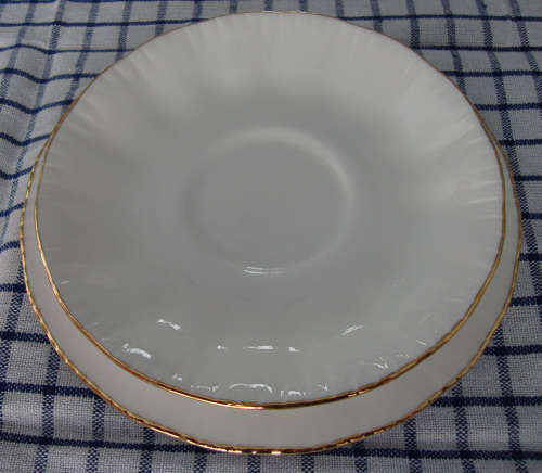 VINTAGE PARAGON TEA TRIO WITH GILT TRIM