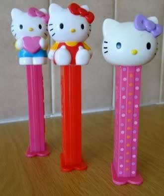 THREE HELLO KITTY, PEZ DISPENSERS