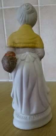 TWO BEAUTIFUL CERAMIC FIGURINES, THE OLD LADY AND THE SEAMSTRESS