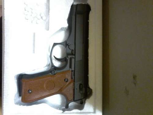 SPRING OPERATED BB GUN