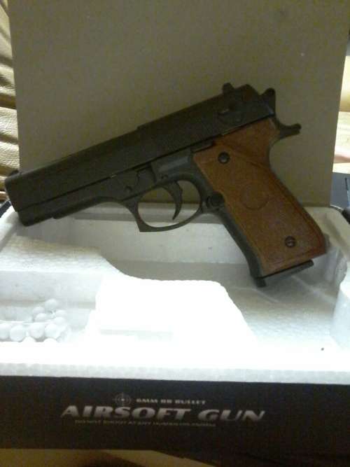 SPRING OPERATED BB GUN