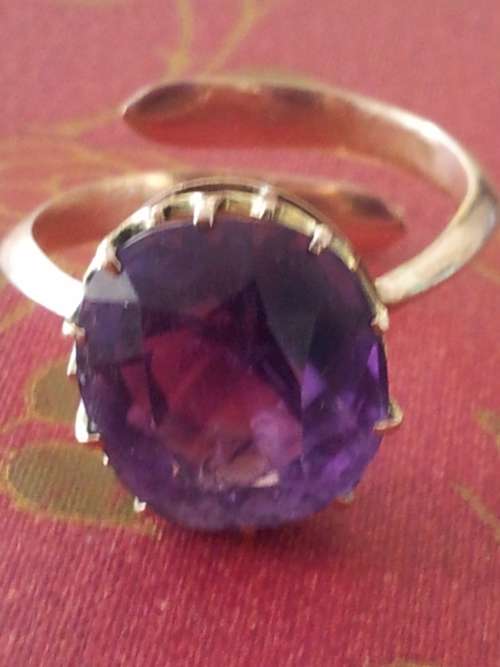 Solid 10 ct Gold Ring with Massive Amethyst in ornate crown setting. Adjustable.