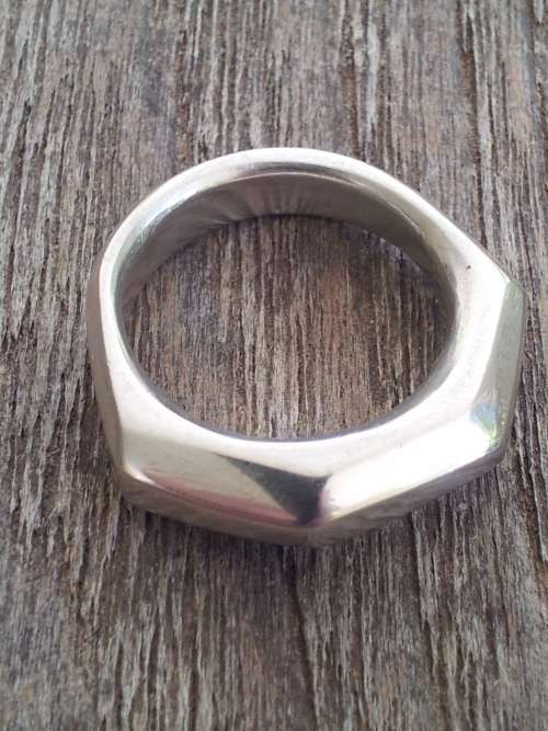 Solid Sterling Silver Knuckleduster Ring.  9 Facets. Handmade, one of a kind. 13.1 grammes