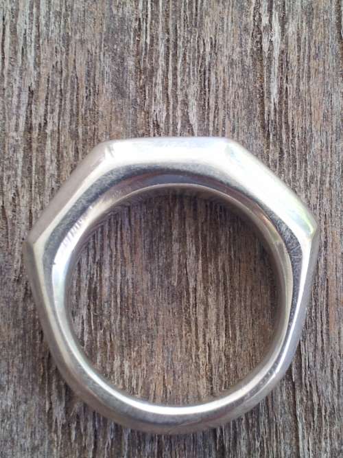 Solid Sterling Silver Knuckleduster Ring.  9 Facets. Handmade, one of a kind. 13.1 grammes