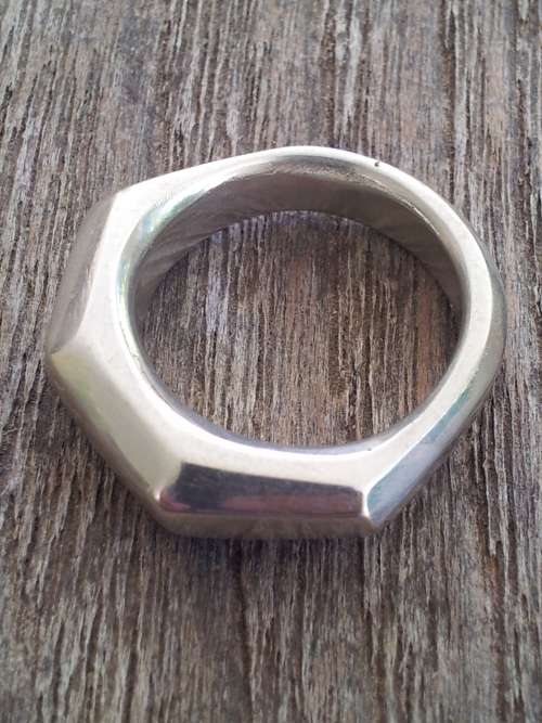 Solid Sterling Silver Knuckleduster Ring.  9 Facets. Handmade, one of a kind. 13.1 grammes