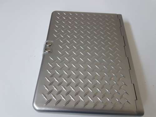 New bible in a solid metal box with magnetic clasp. New Living Translation.