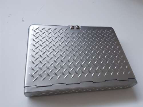 New bible in a solid metal box with magnetic clasp. New Living Translation.