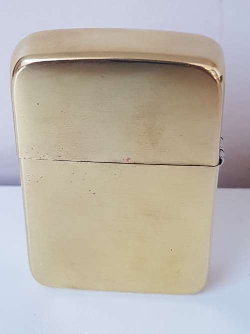 Excellent new condition. Zippo XXX lighter. Solid brass. Working.  Gold colour.