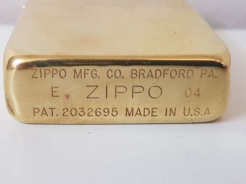 Excellent new condition. Zippo XXX lighter. Solid brass. Working.  Gold colour.