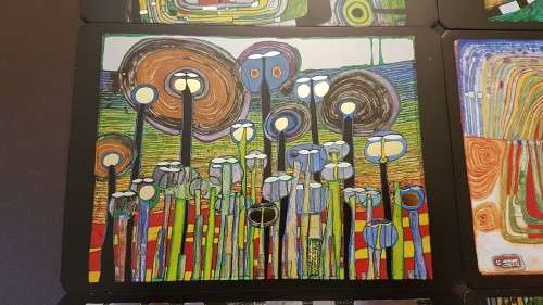 Friedensreich Hundertwasser (1928-2000). Collage of 15 Art Cards . Silver and Gold Imprints. Framed.