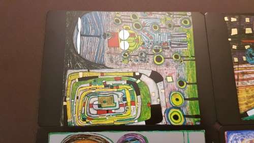 Friedensreich Hundertwasser (1928-2000). Collage of 15 Art Cards . Silver and Gold Imprints. Framed.