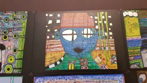 Friedensreich Hundertwasser (1928-2000). Collage of 15 Art Cards . Silver and Gold Imprints. Framed.