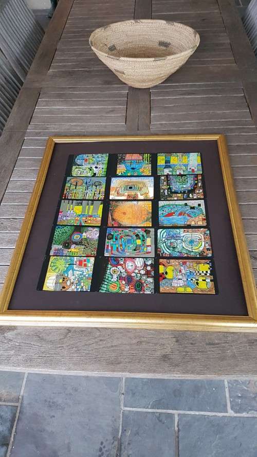 Friedensreich Hundertwasser (1928-2000). Collage of 15 Art Cards . Silver and Gold Imprints. Framed.