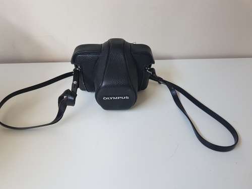 Olympus OM1 camera with lens, zoom lens, tripod, flash, cases, carrybag. Treasured possession.