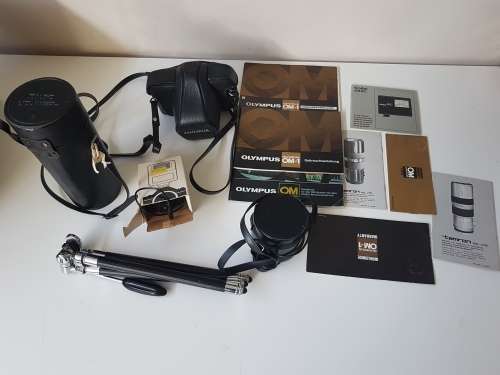 Olympus OM1 camera with lens, zoom lens, tripod, flash, cases, carrybag. Treasured possession.