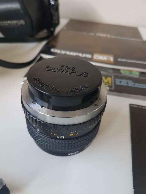 Olympus OM1 camera with lens, zoom lens, tripod, flash, cases, carrybag. Treasured possession.